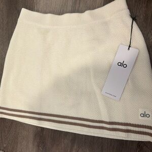 ALO TENNIS CLUB SWEATER KNIT SKIRT SIZE SMALL. NEVER WORN, WITH TAGS